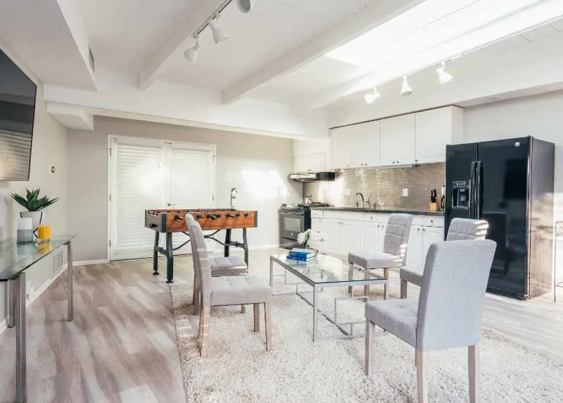 Journey Hillside kitchen and dining area with a foosball table