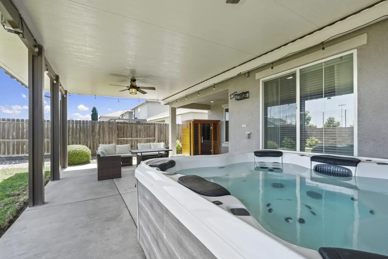 Outdoor hot tub and sauna shown by Roseville Recovery Center